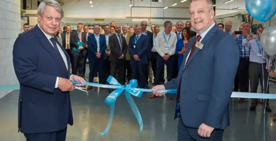 Ribbon cutting by Paul Dupee & Terry Allison