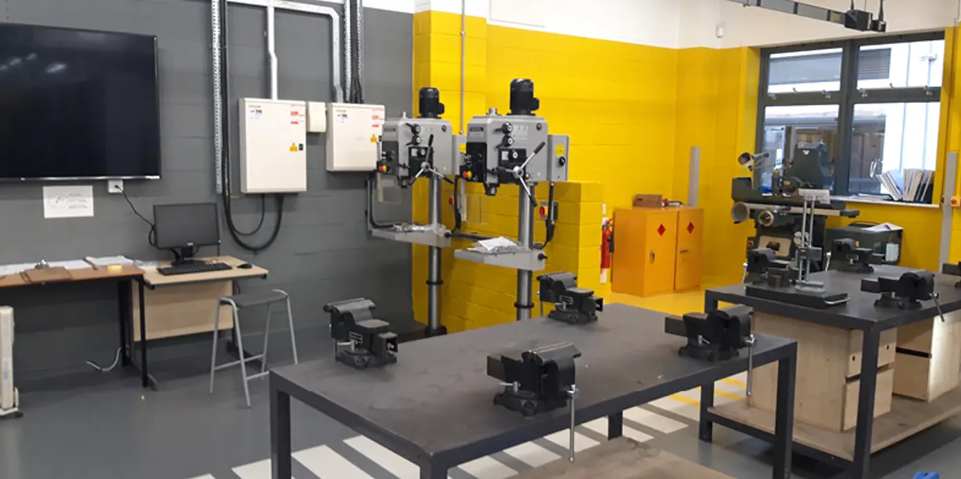 Two Colchester drills in the college workshop