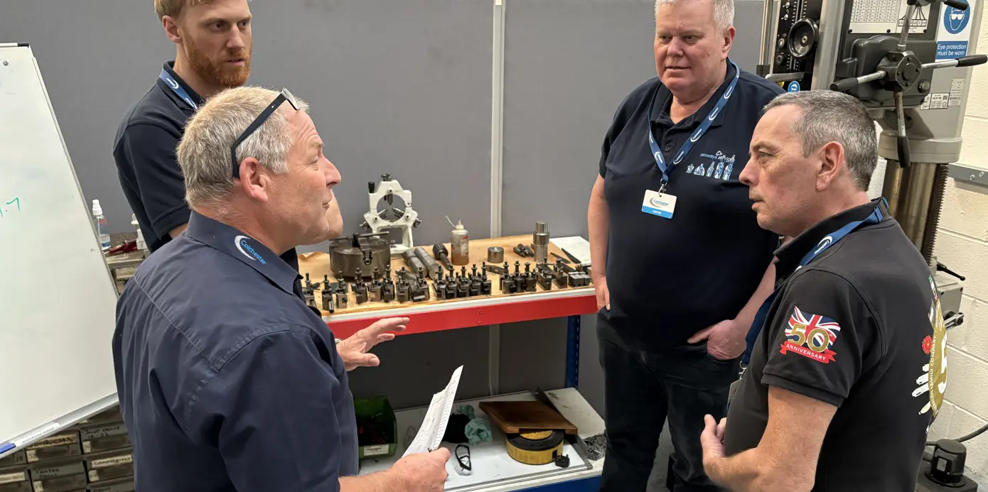 Colchester Training Academy teacher talking to delegates from Seaways