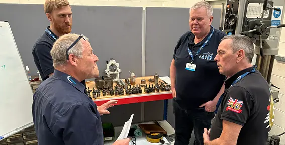 Colchester Training Academy teacher talking to delegates from Seaways